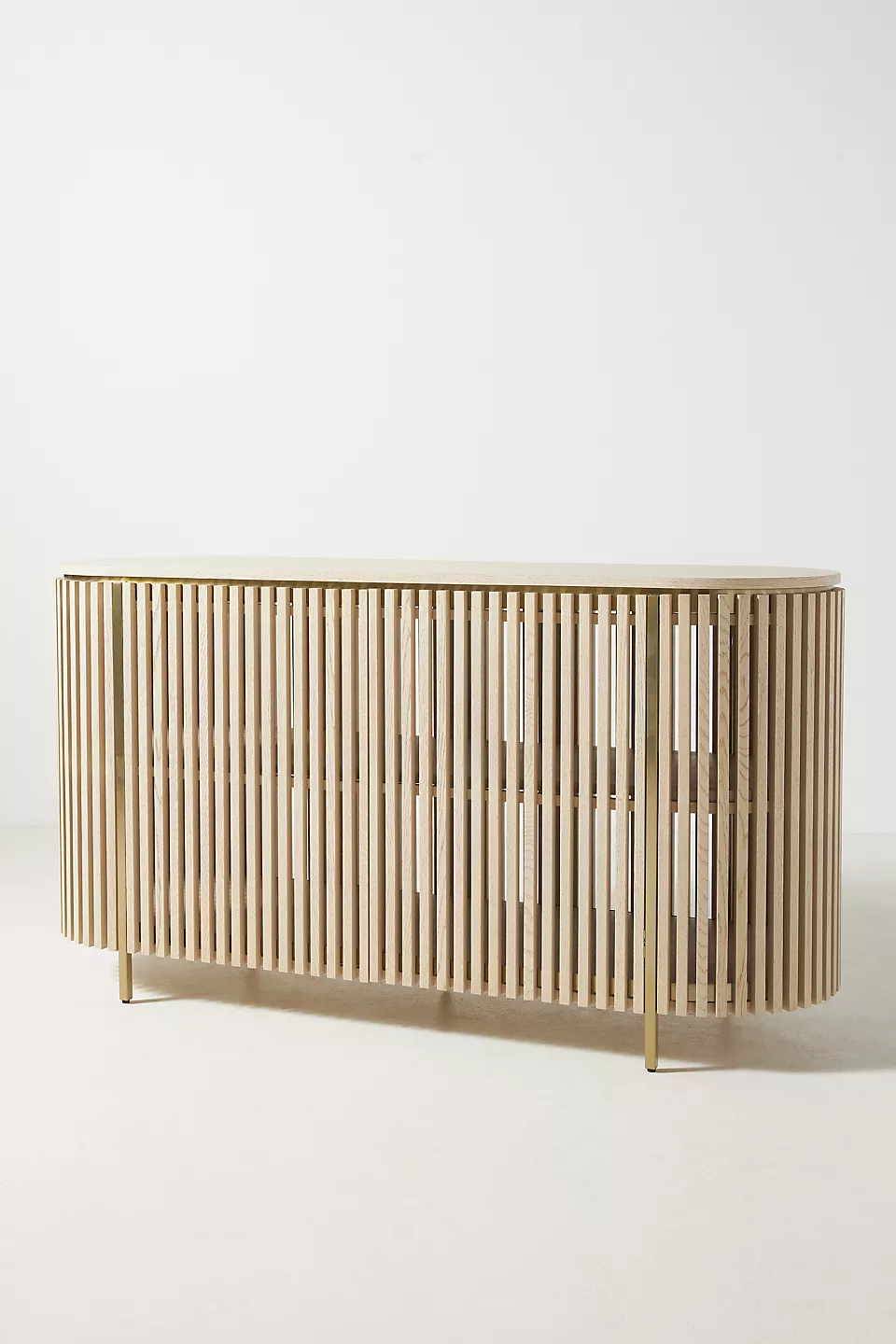 A wooden sideboard. A wooden console table.