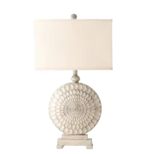 A white antique style table lamp.