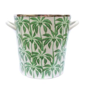 A white and green ceramic ice bucket.