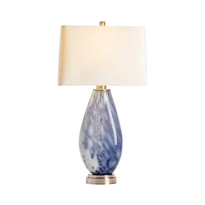 A blue and white glass table lamp.