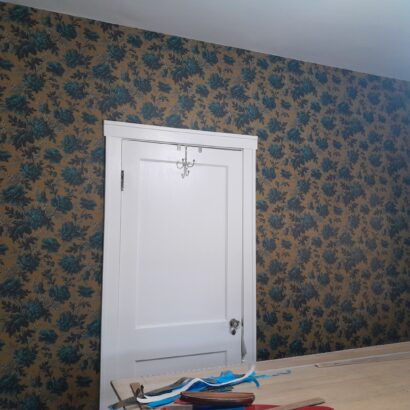 Gold and teal, vintage floral wallpaper.