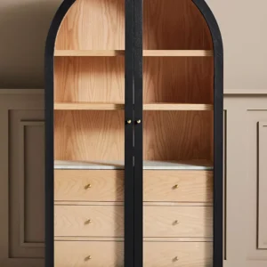 A wooden storage cabinet. An arched wood cabinet.