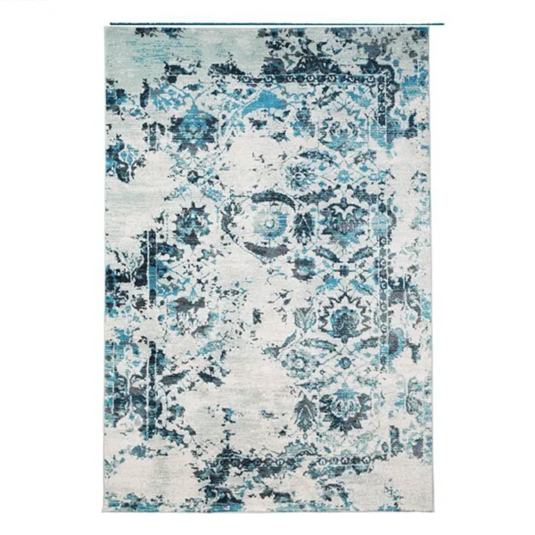 A white and blue antique pattern rug.