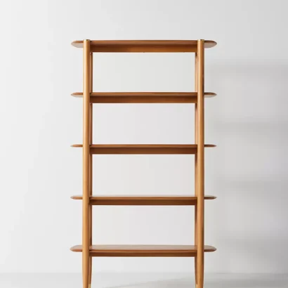 A wooden shelf. A wooden bookshelf. A wooden shelving unit.