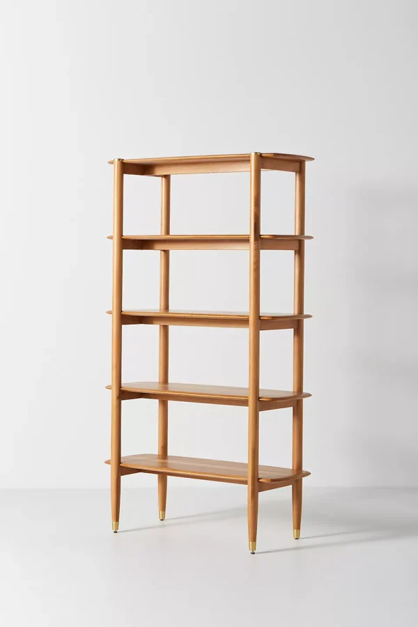 A wooden shelf. A wooden bookshelf. A wooden shelving unit.