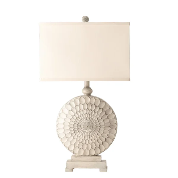 A white antique style table lamp.