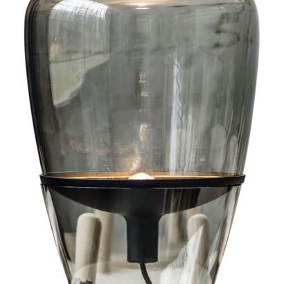 A glass balloon shaped table lamp.