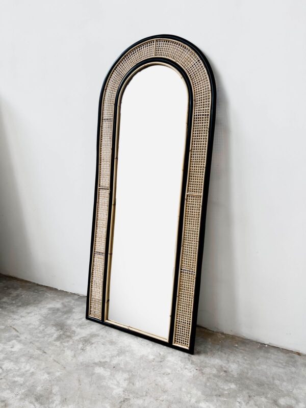 An arched mirror.